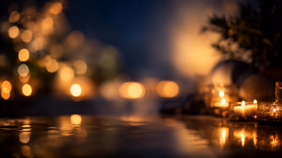 Soft candlelit abstract lights reflected on water